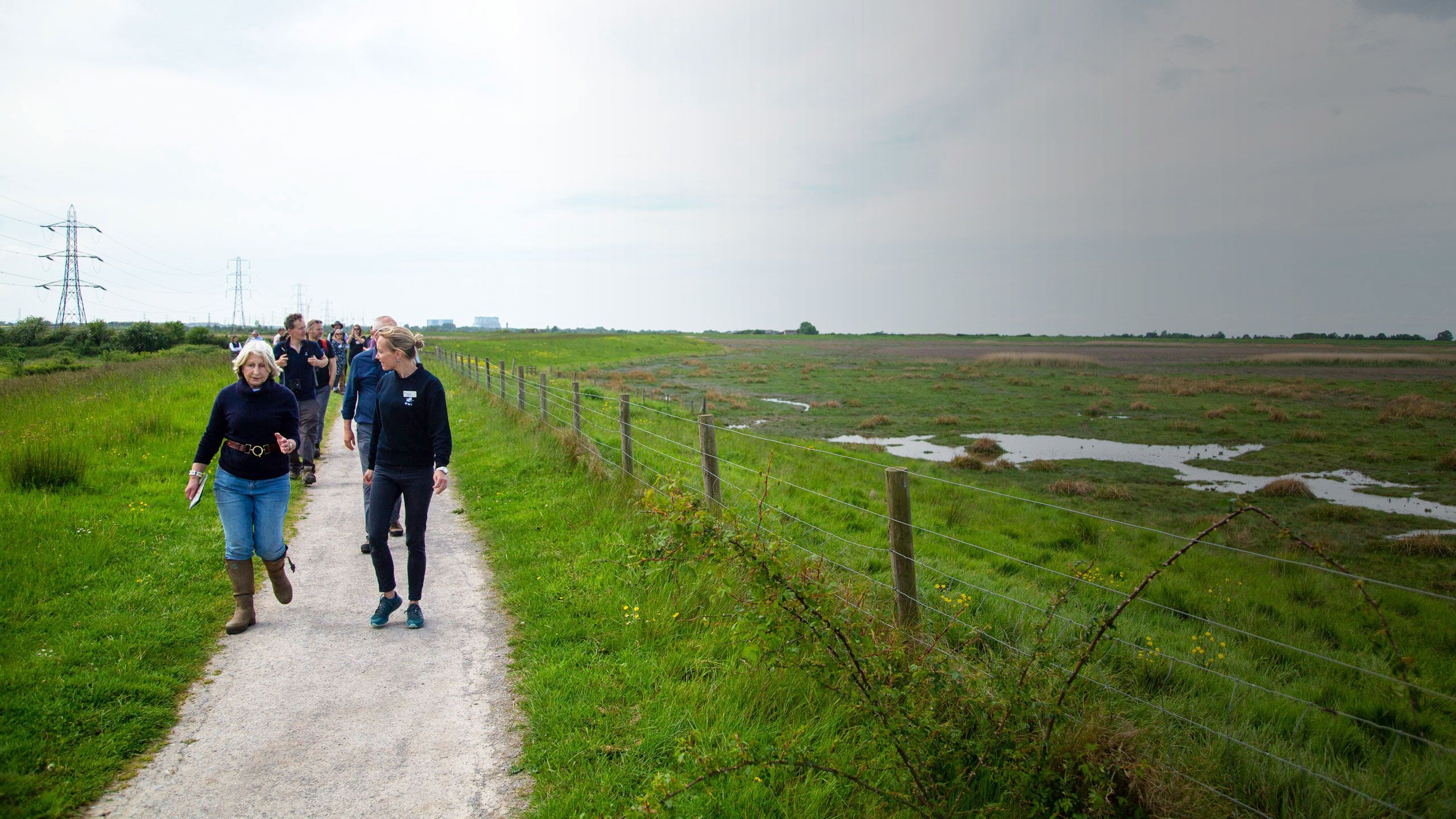 WWT staff member leading a tour of WWT Steart at the launch event for Steart becoming part of the Somerset SNNR